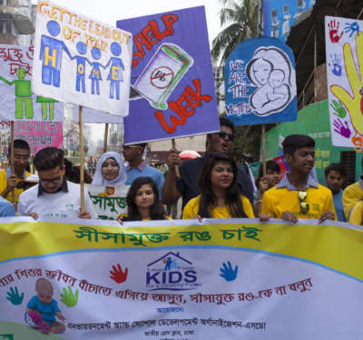 Bangladeshi youth at a rally calling for the elimination of lead from paints.